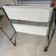 Vintage folding dessert table in chrome metal with enamelled trays.