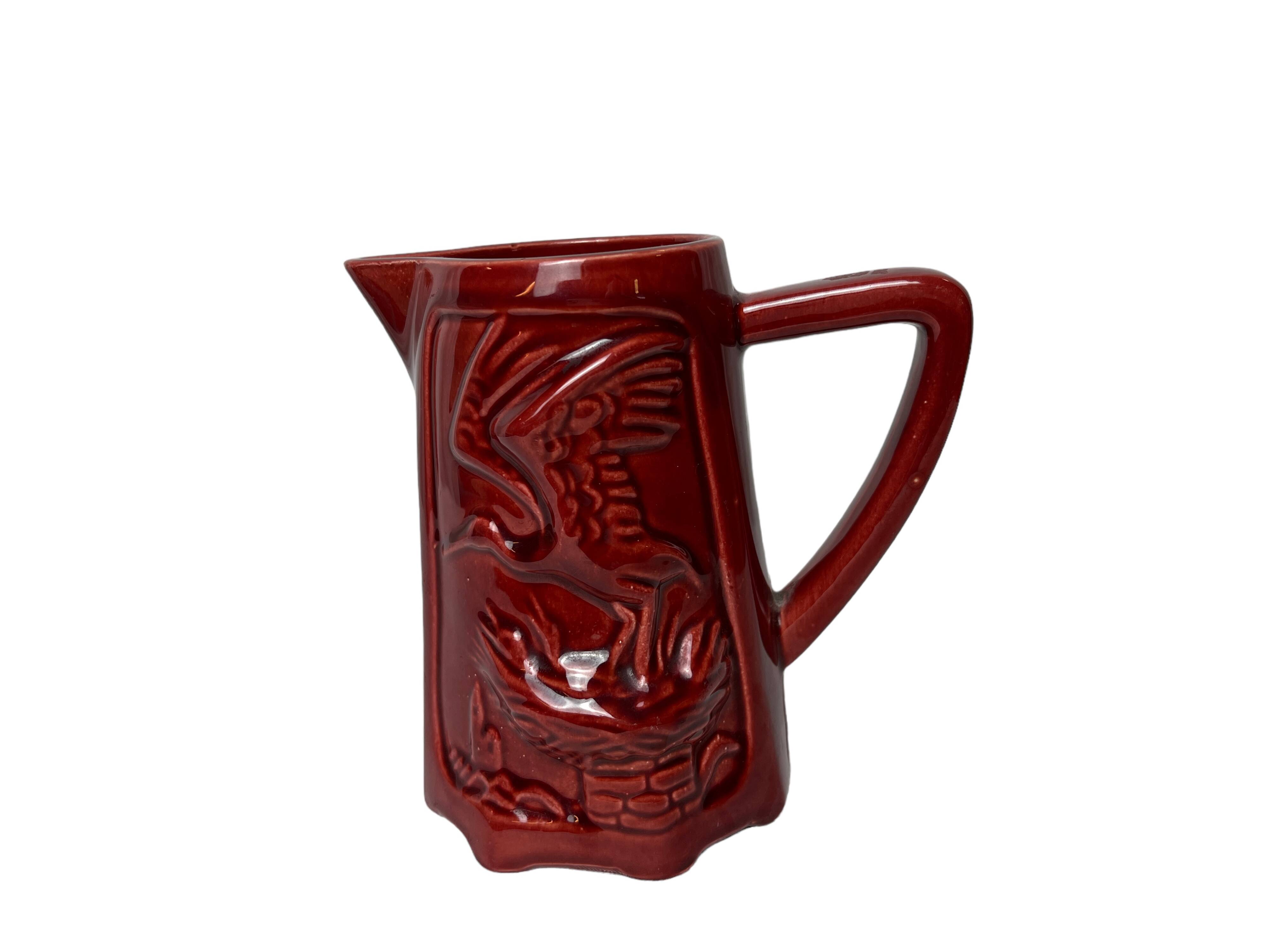 Saint Clement red earthenware pitcher with stork decoration circa 1940