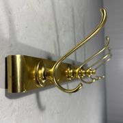 Gold coloured aluminium wall coat rack 1960’s