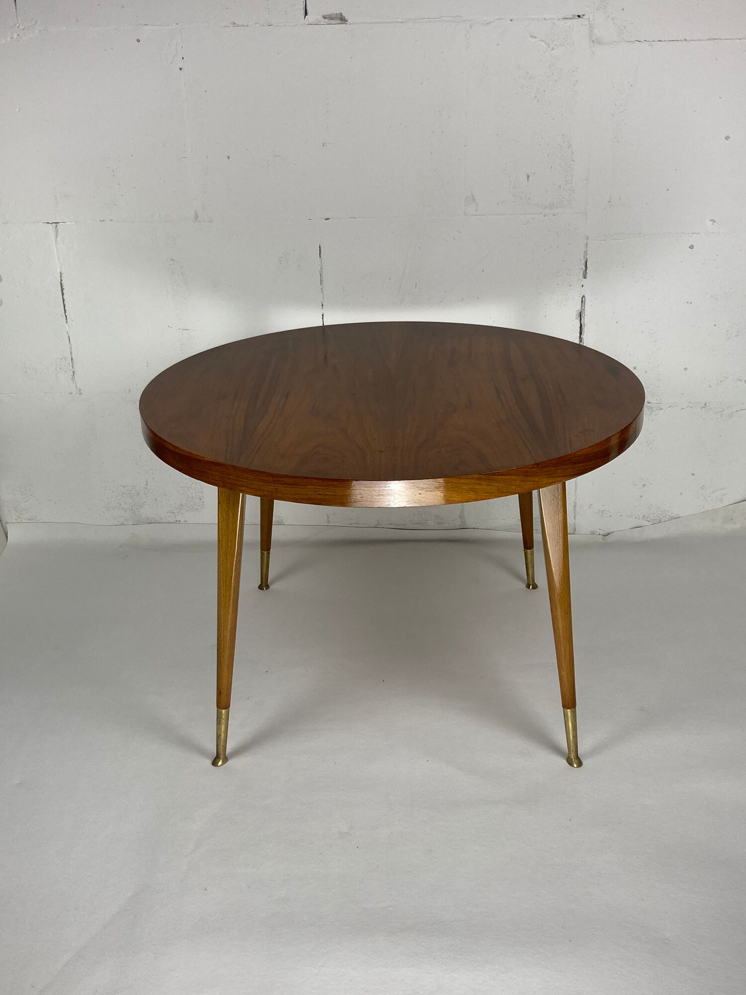 Italian round table with tapered brass leg ends, 1950s