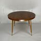 Italian round table with tapered brass leg ends, 1950s