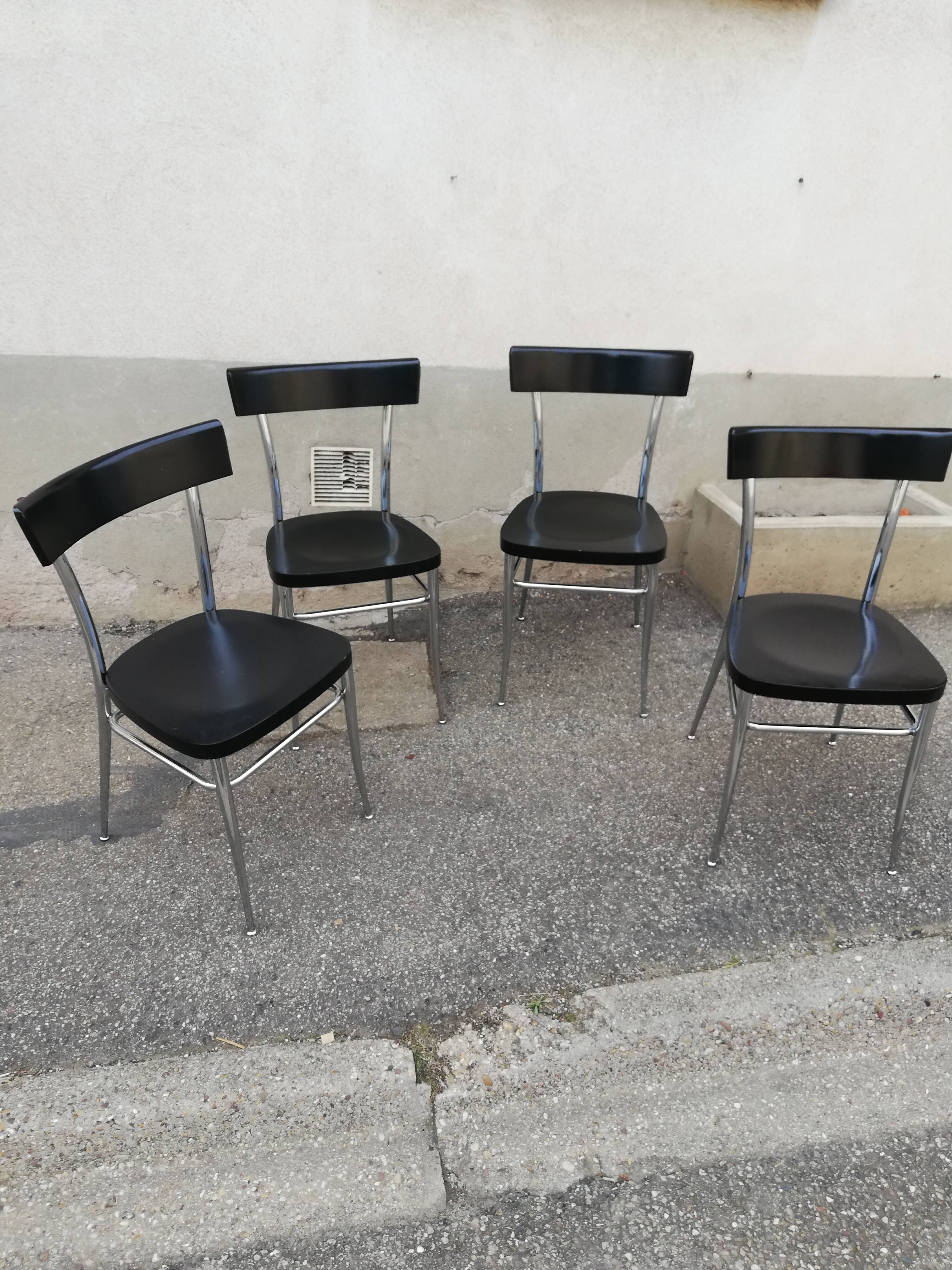 Set of 4 vintage chairs chrome and black wood