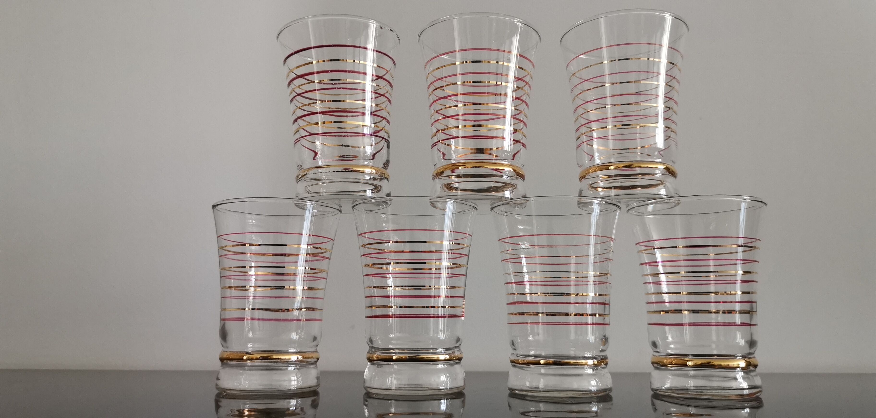 Set of 7 vintage glasses bordered gold and red years 50/60