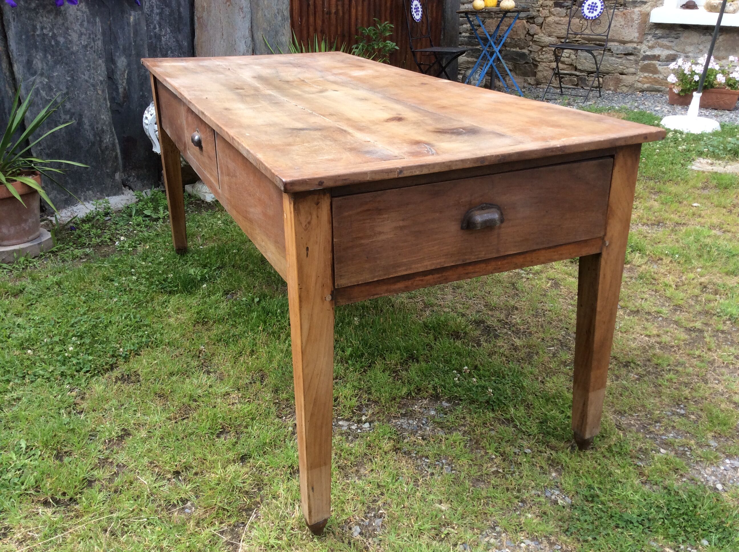 Farm table in cherry tree of the country of Redon with spindle feet.
