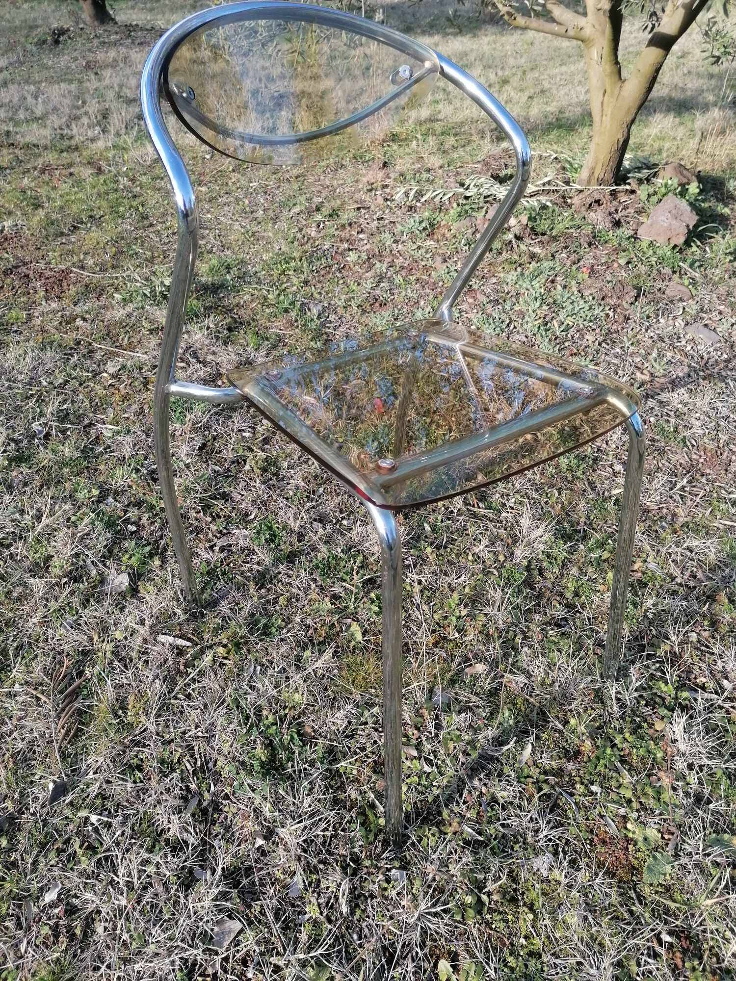 Vintage designer chair in plexiglass and chrome 1980