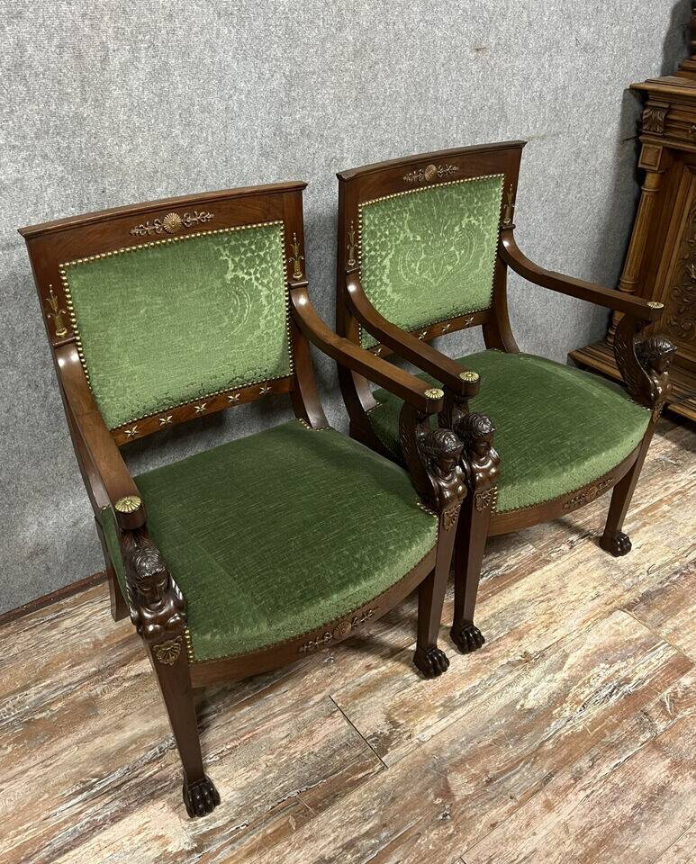 Pair of Empire-Consulate armchairs in molded and carved mahogany