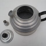 old aluminum kettle with a sufffloating system