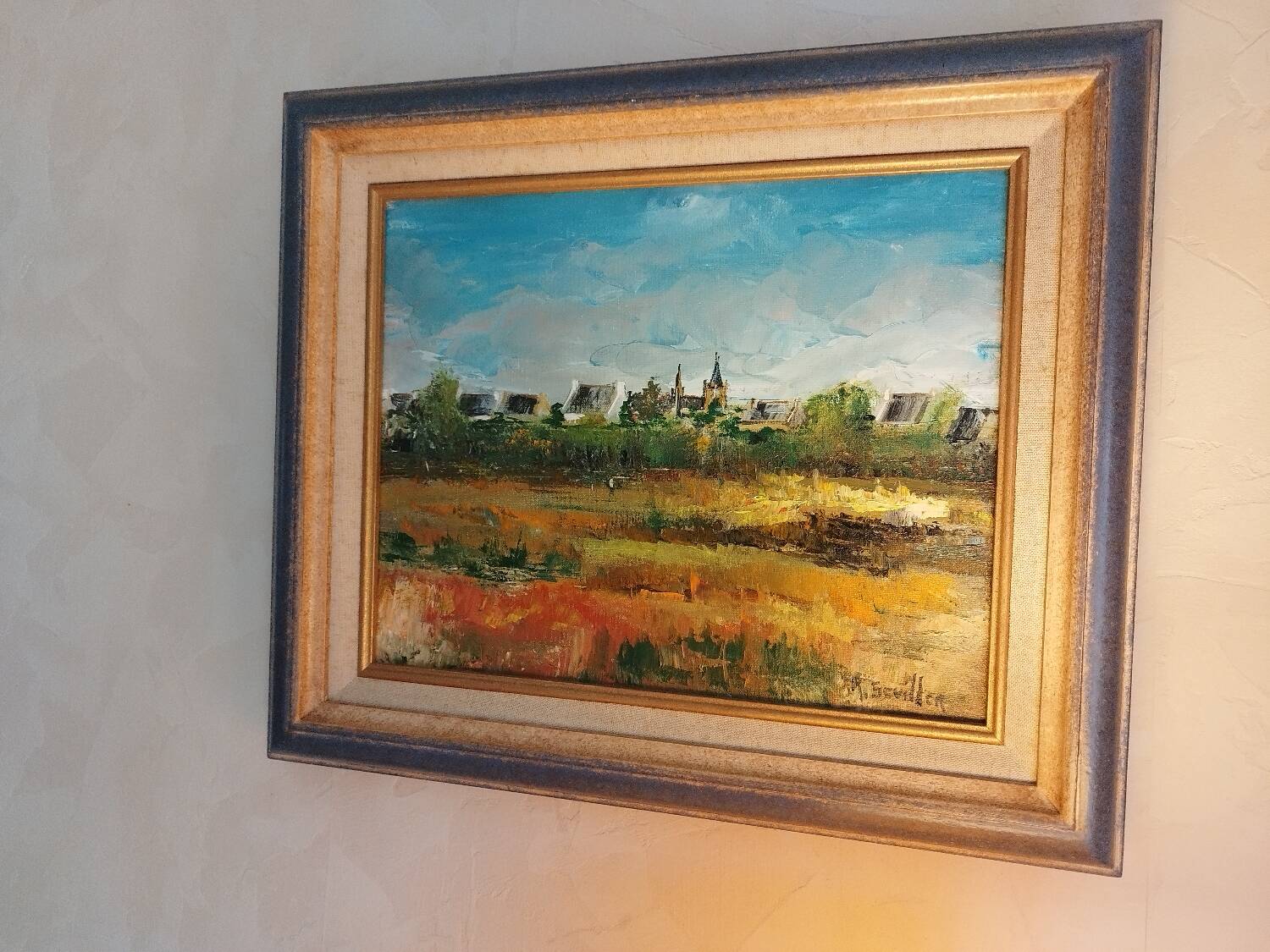 Oil on canvas "a Village in Brittany" signed by Raymond Scuiller