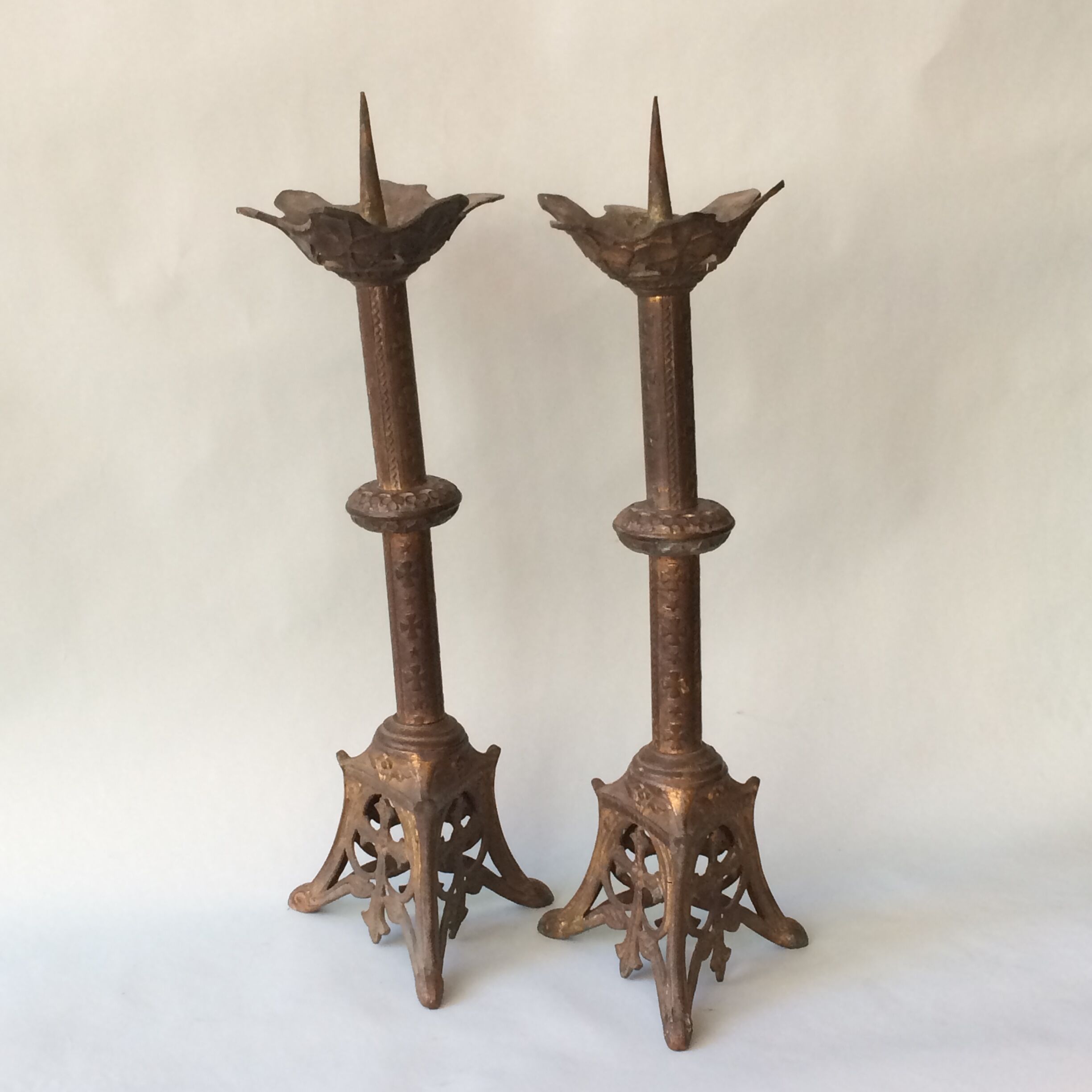 Pair of gilded bronze church candle holders