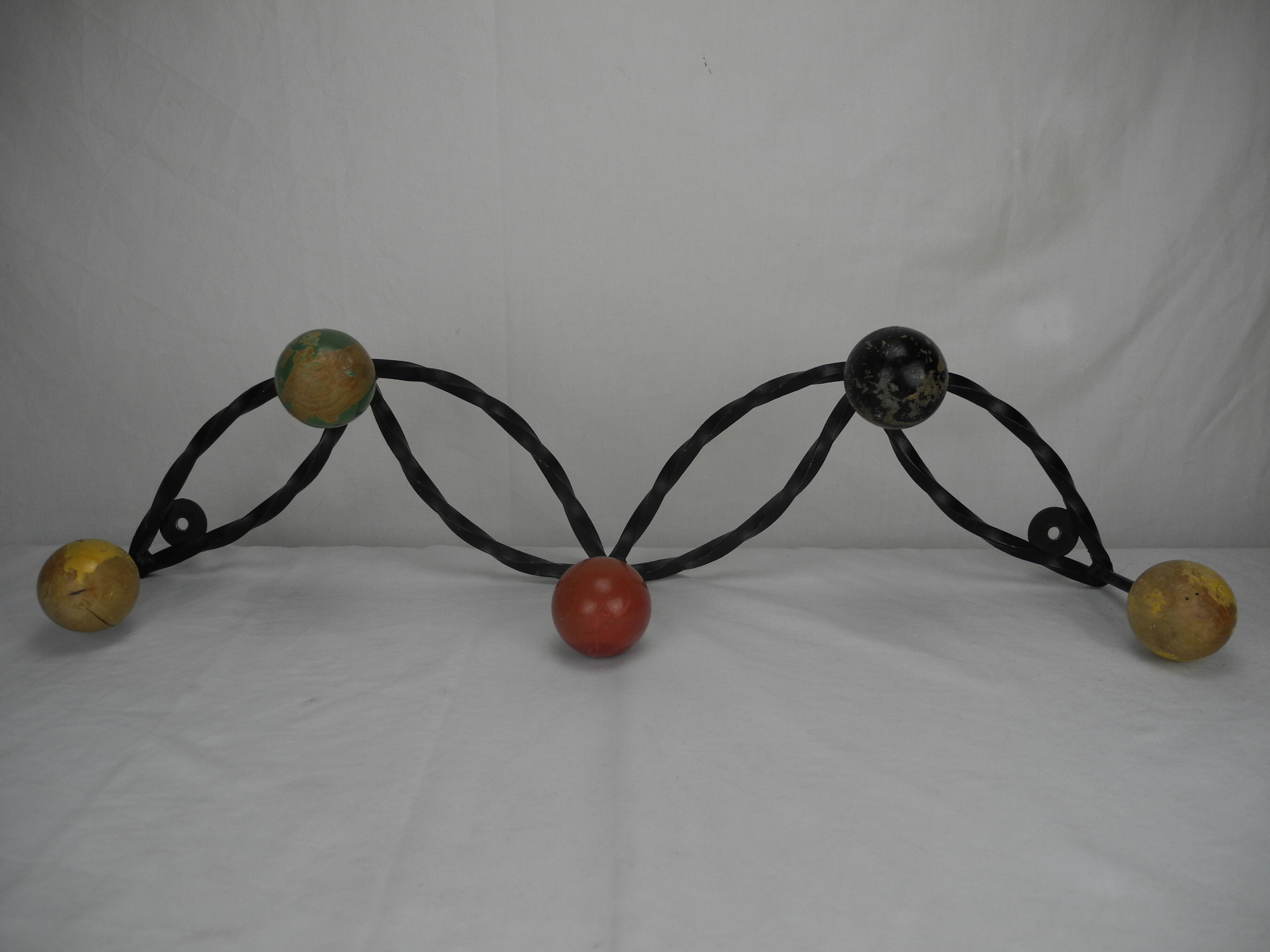 Old wrought iron coat rack