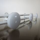 White metal coat holder in 70s