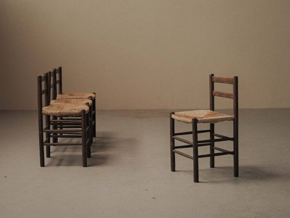 Set of four wooden and straw chairs, around 1960.