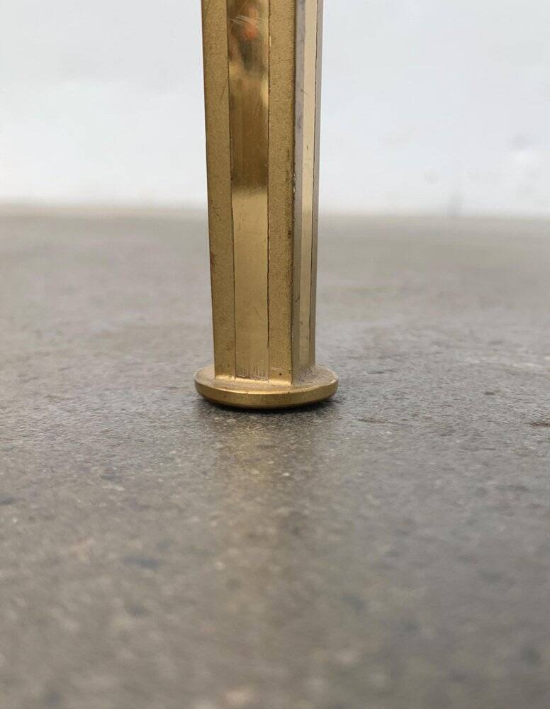 Mid-century Hollywood Regency style coffee table in brass and glass, made in Germany by Vereinigte Werkstätten, 1960s.