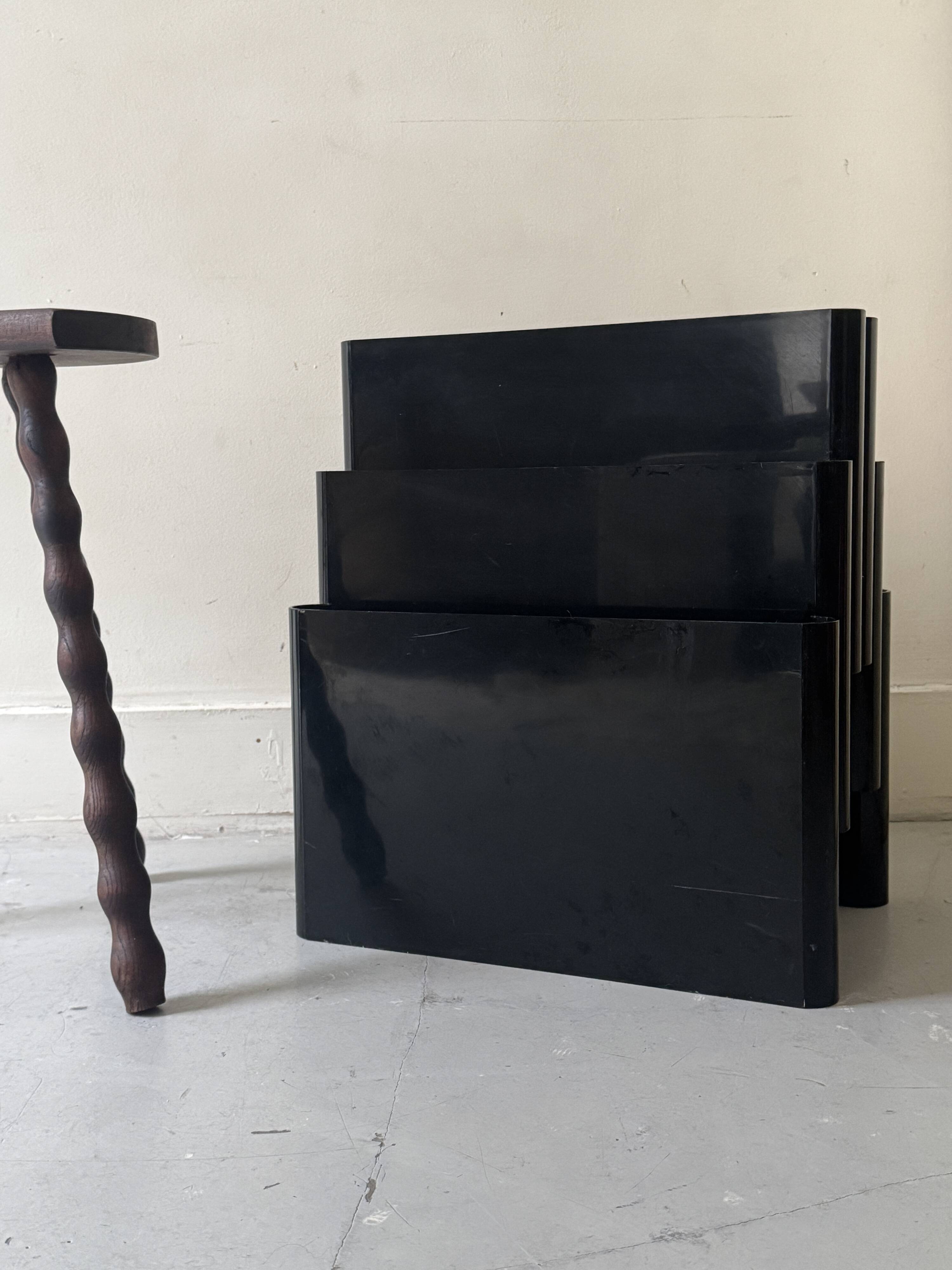 Large black magazine rack by Giotto Stoppino for Kartell, Italy 1970.