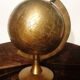 Old terrestrial globe in copper, brass