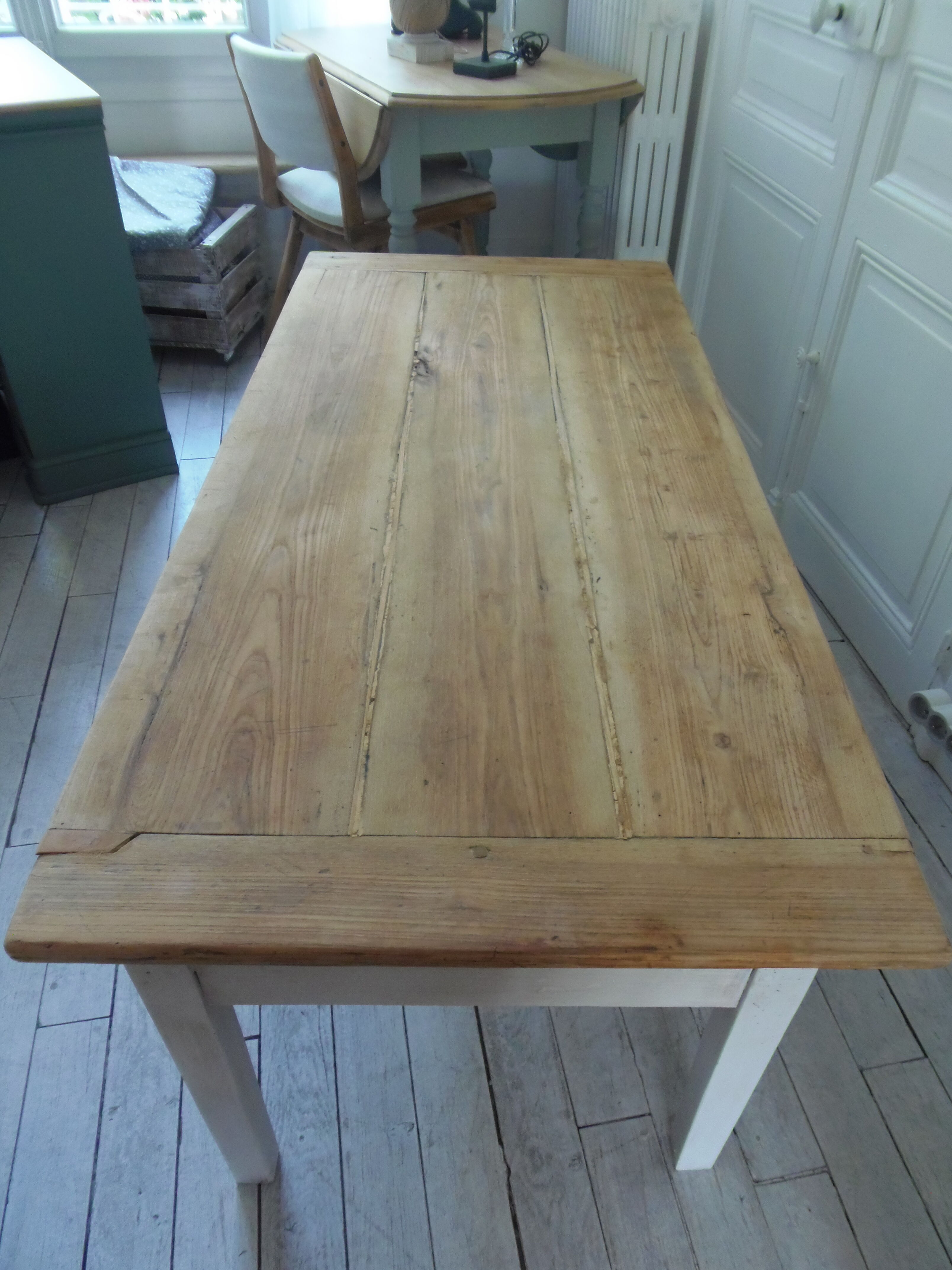 Coffee table made from an authentic farmhouse table, leg patinated pearl gray