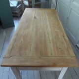 Coffee table made from an authentic farmhouse table, leg patinated pearl gray