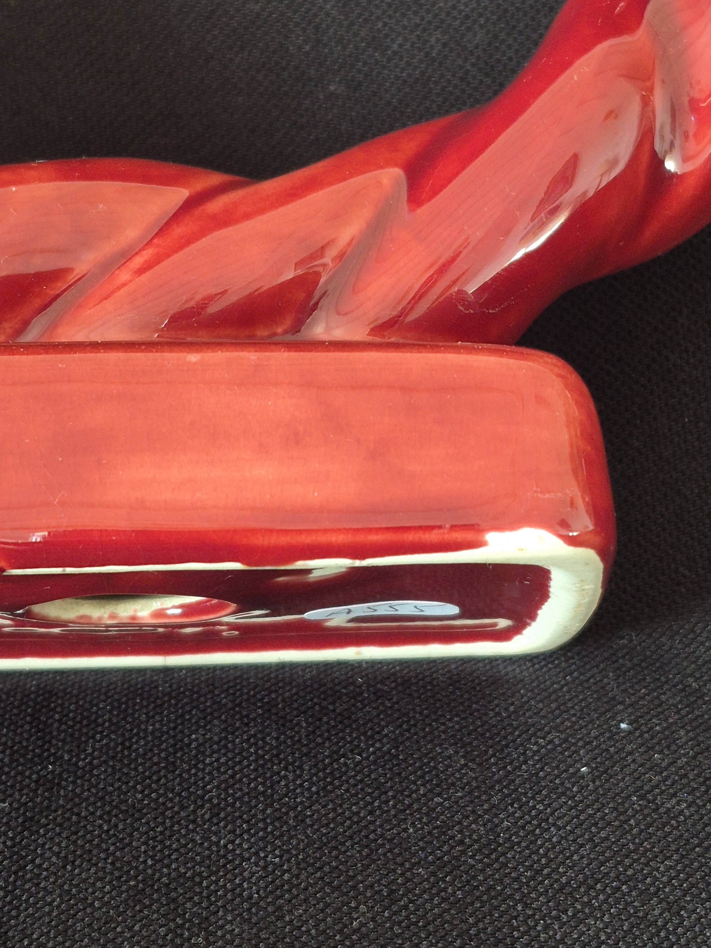 Ceramic chandelier, signed LONGCHAMP, twisted old red