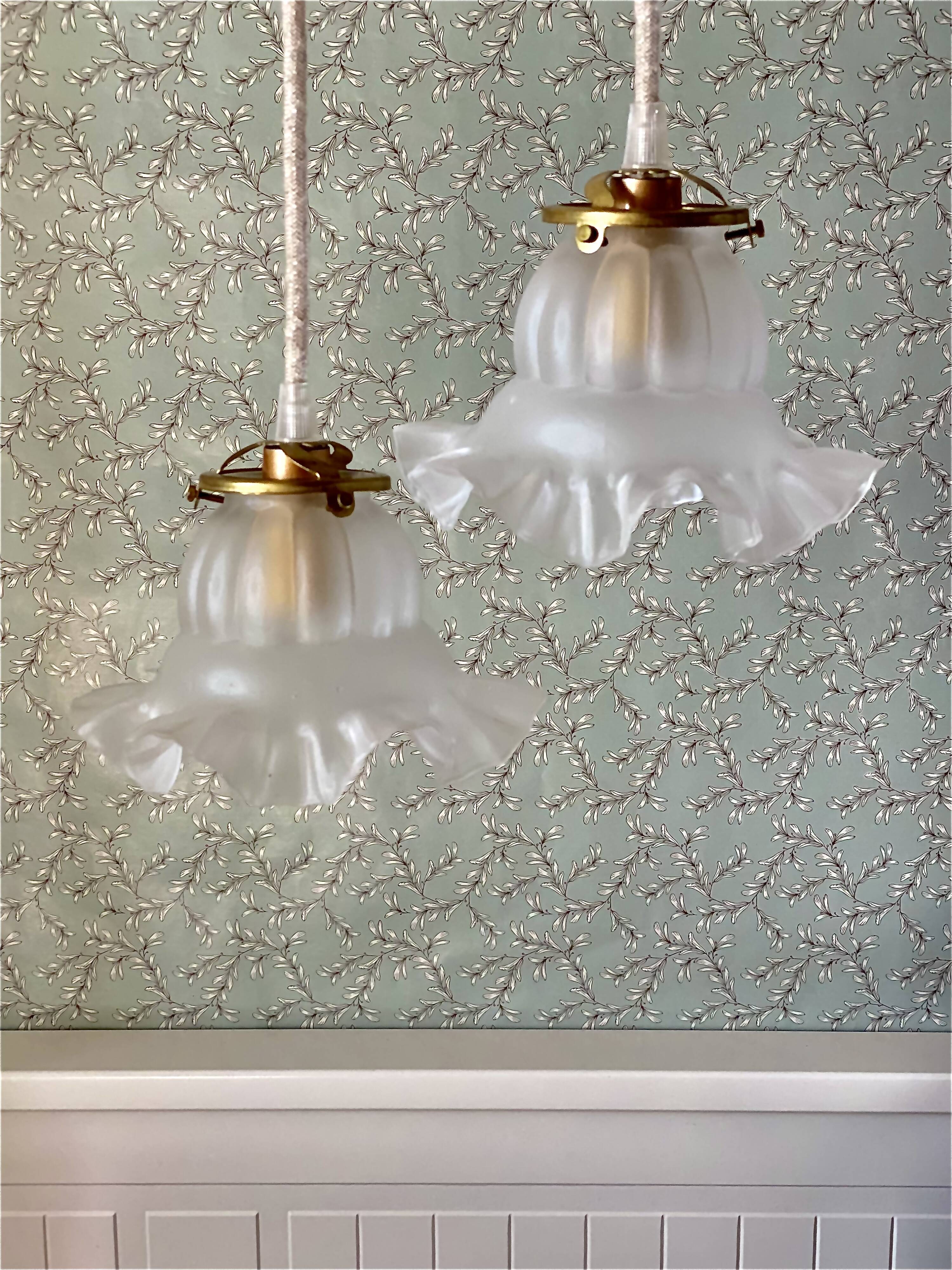 Two vintage tulip pendant lights in molded glass
