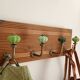 Wall-mounted coat rack in wood – 40 cm – 4 hooks in metal and green ceramic