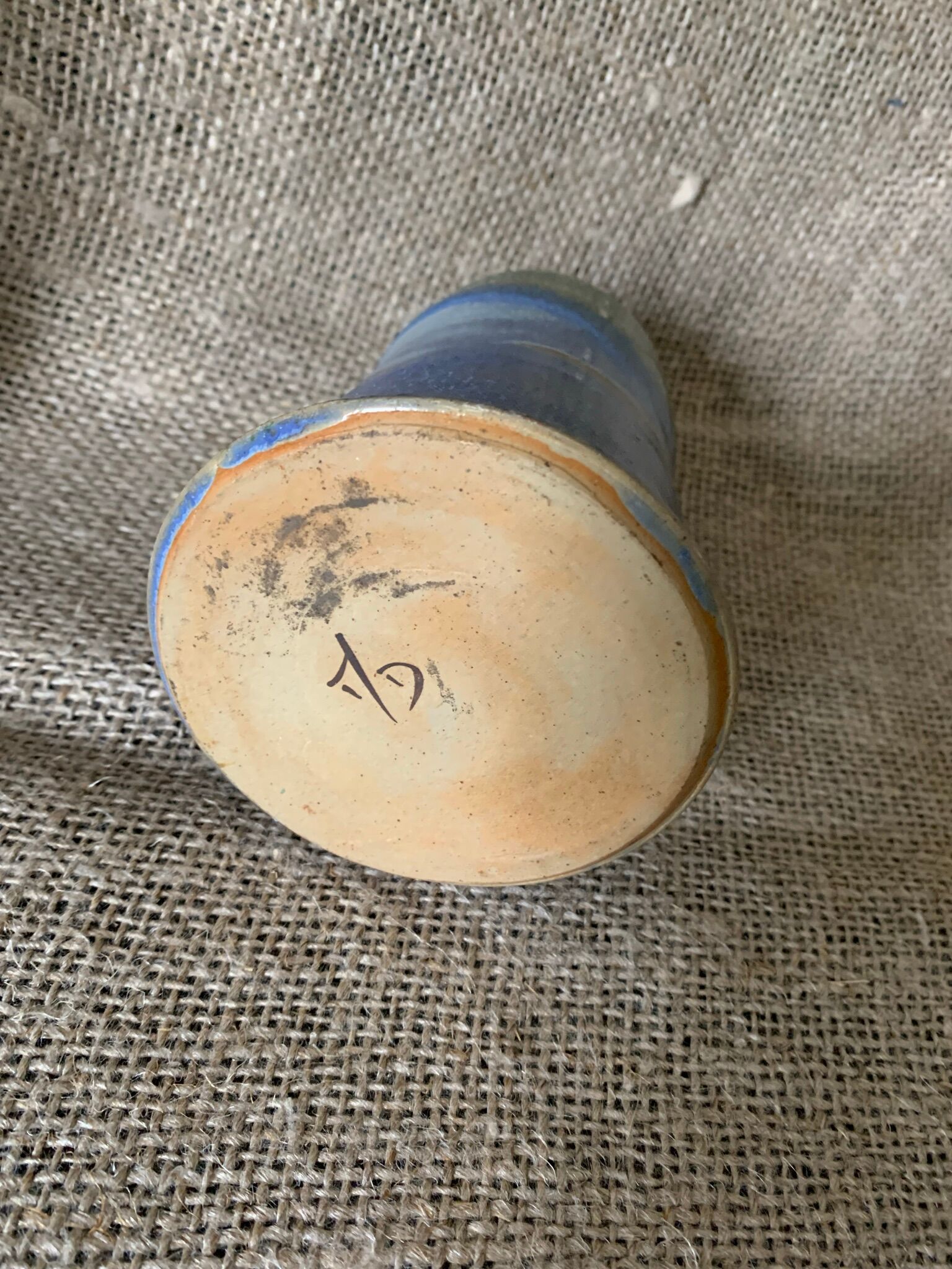 Vase in blue enamelled sandstone sign