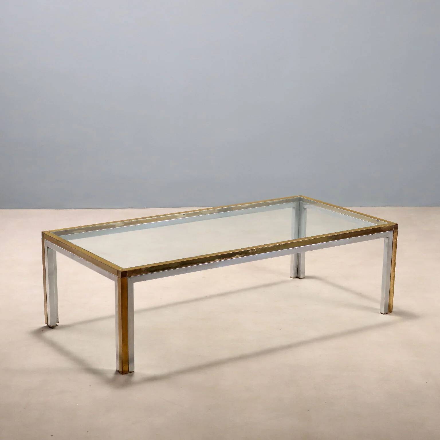 Vintage coffee table in metal, brass and glass, 1970s design.