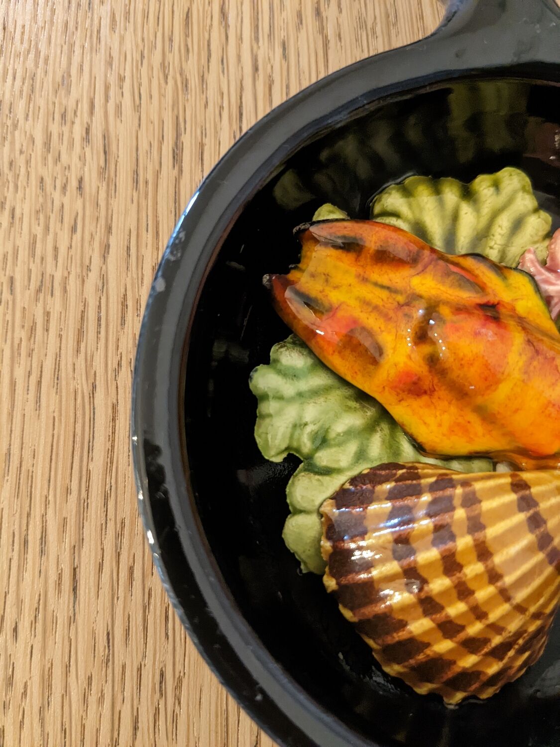 Two trompe l'oeil ceramic casseroles