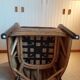 Fauteuil rotin tressé et bois exotique