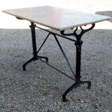 Bistro table, 1900, cast iron foot and marble top.