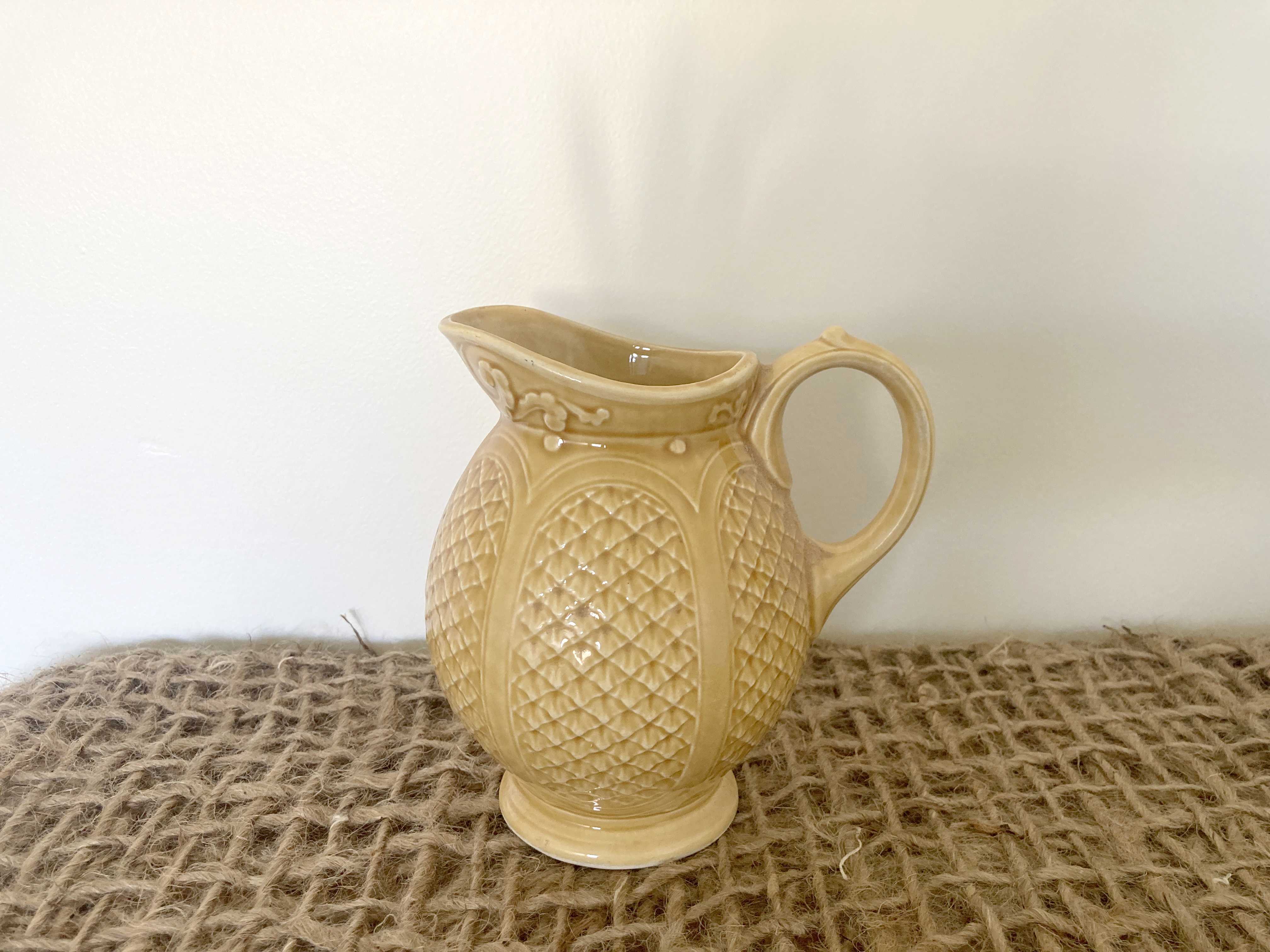 Mustard yellow ceralic pitcher