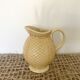 Mustard yellow ceralic pitcher