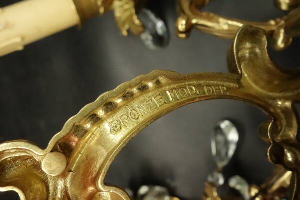 Pair of sconces with Louis XV style tassels