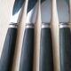 Set de 7 couteaux de table  acier inoxydable et bois noirci