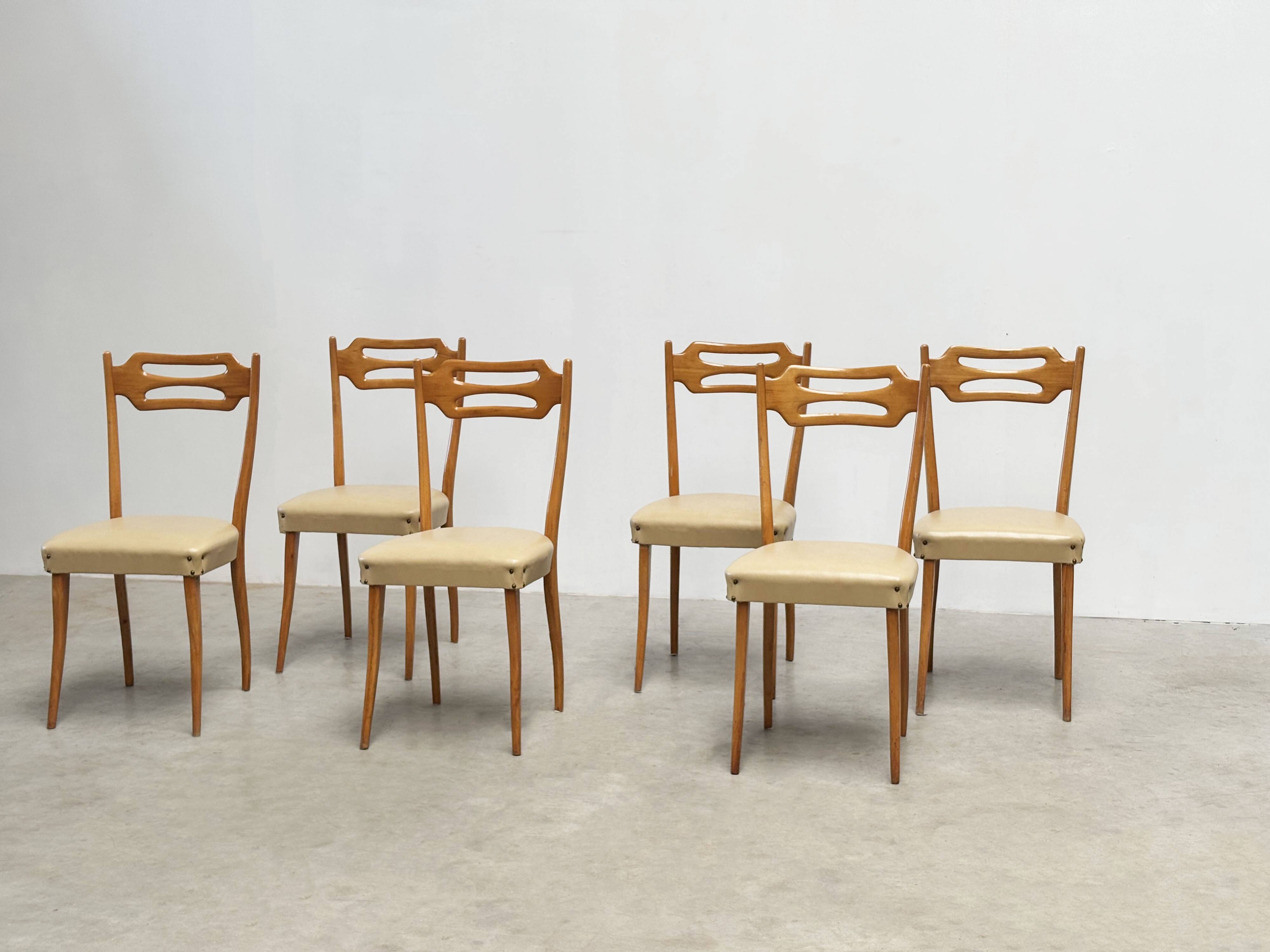 Set of six elegant Italian dining chairs