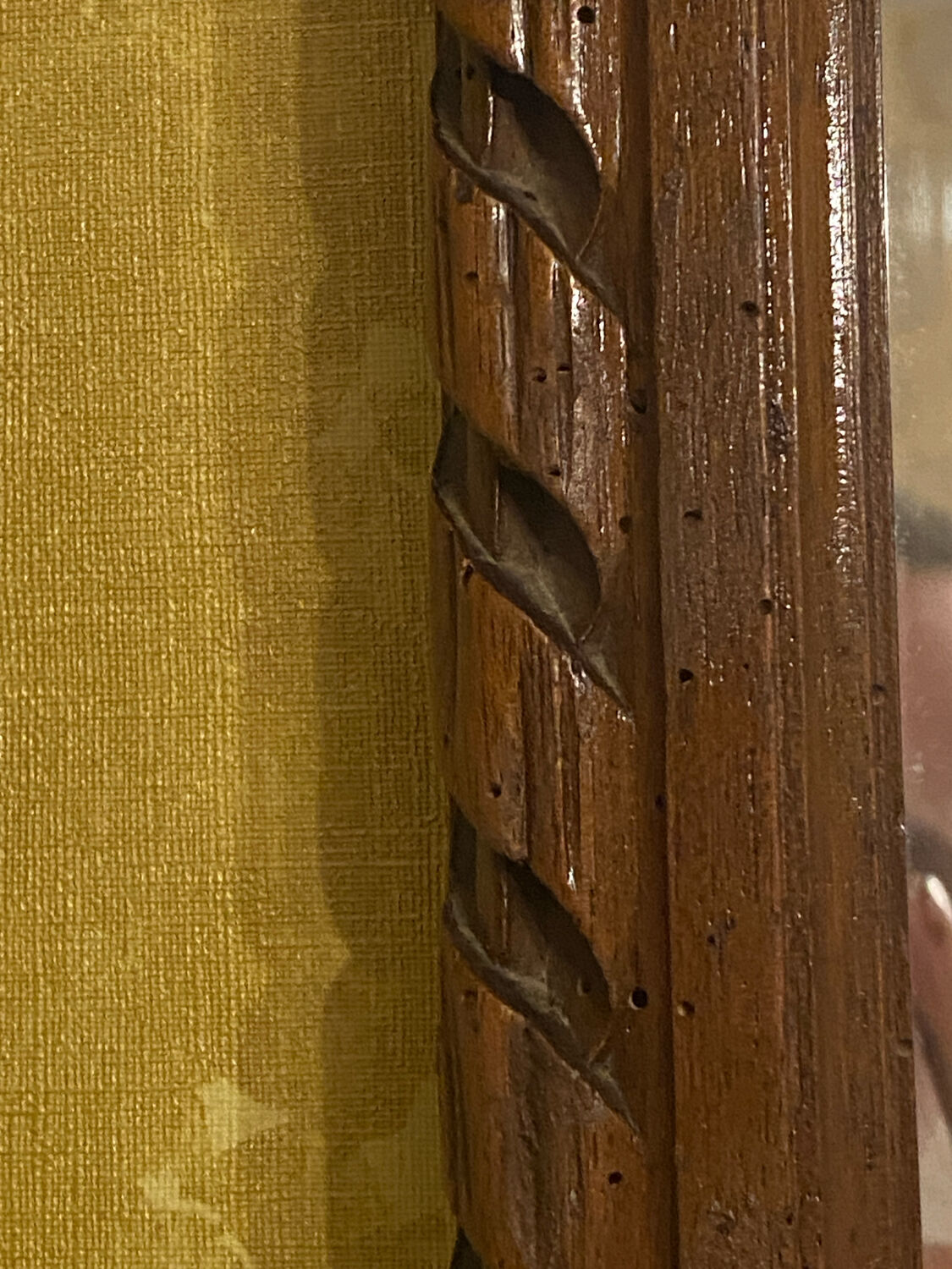 Carved wooden mirror in Louis XVI style