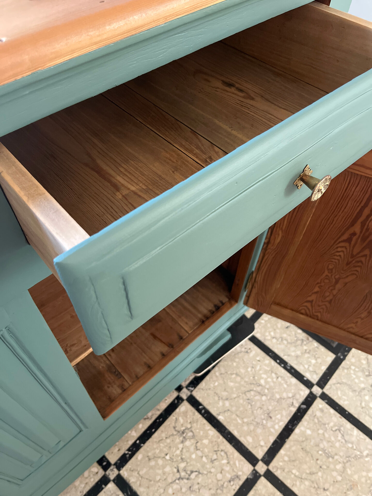 Sage green buffet with moustache legs