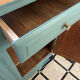 Sage green buffet with moustache legs