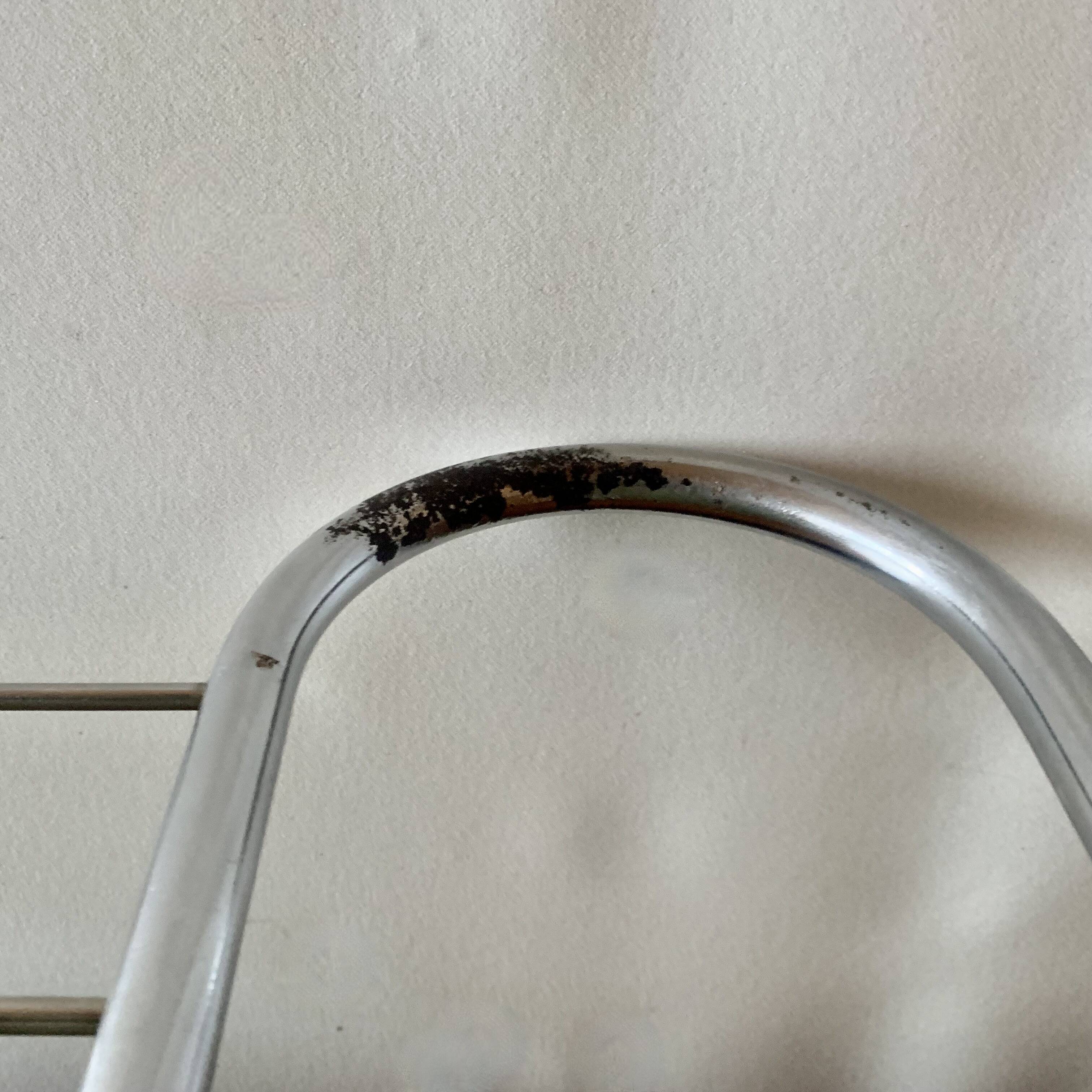 Large vintage wall-mounted coat rack in green Formica and chrome metal