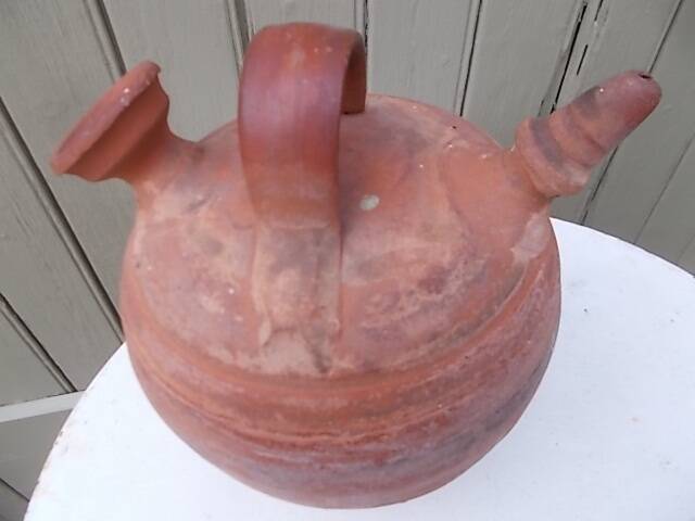 Terracotta gargoulette jug