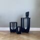 Three wooden side tables