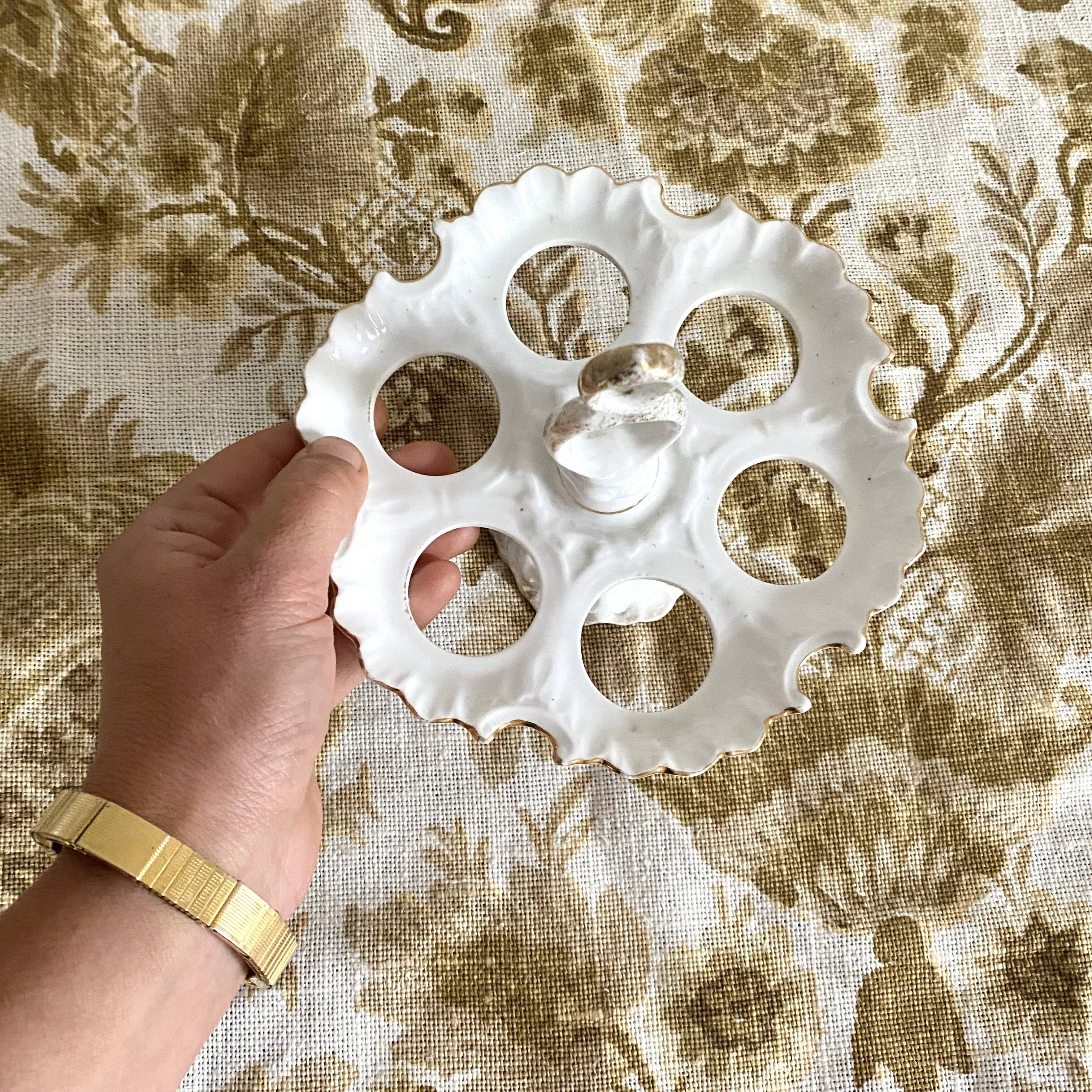 Early 20th century porcelain egg display
