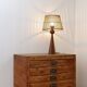 Wooden table lamp in the shape of a bowling pin with a bamboo shade from the 1960s.