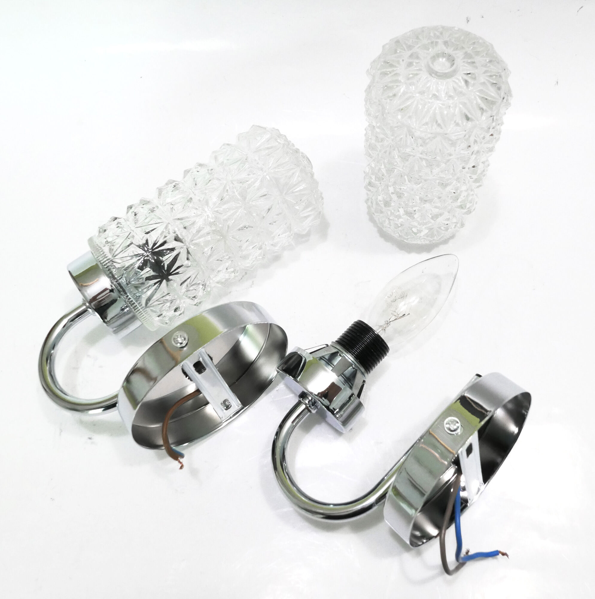 Pair of 1970 chrome metal wall light and molded glass globes.