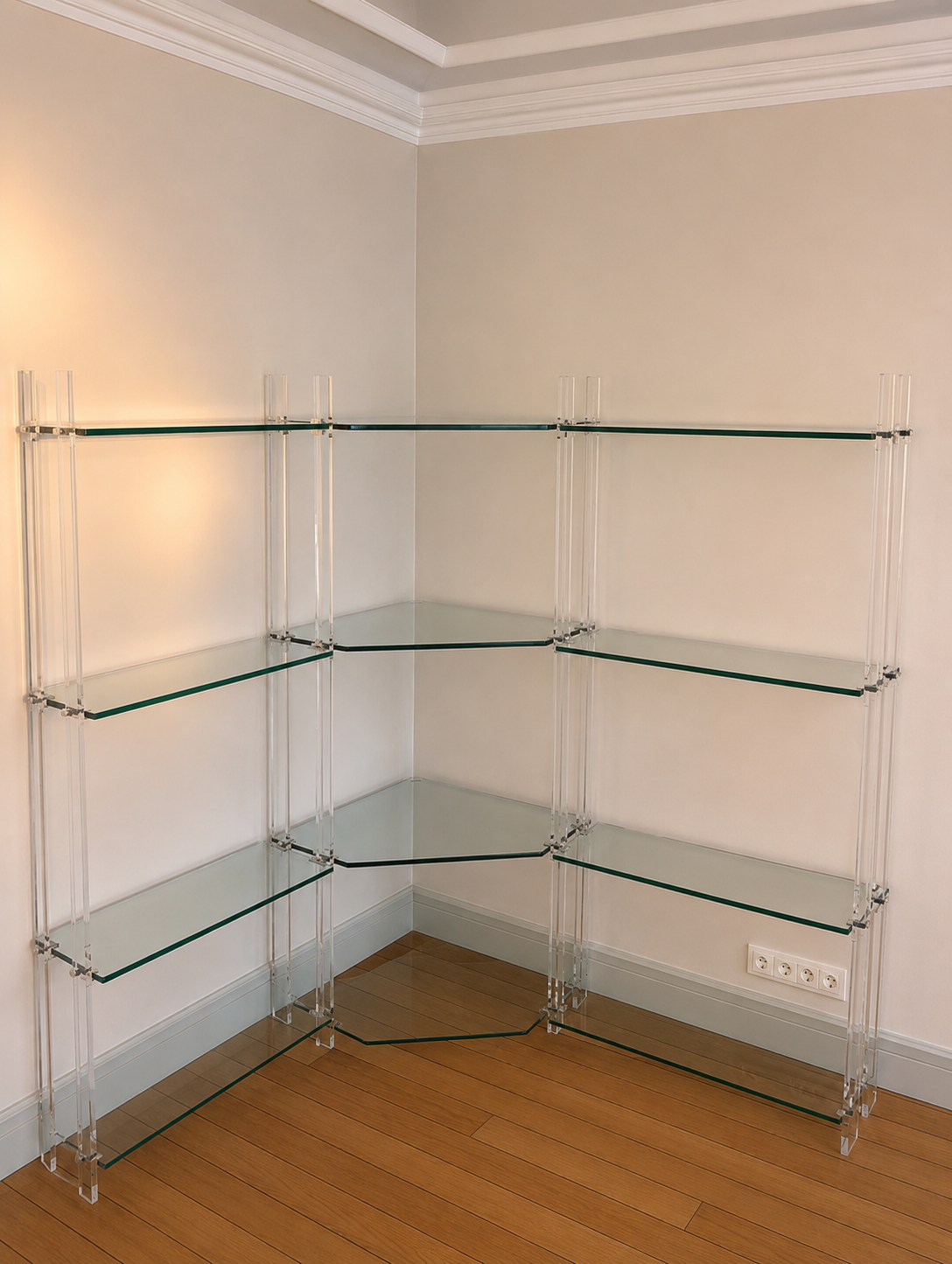 Library/shelves in tempered glass, plexiglass and brass Marais intern.