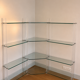 Library/shelves in tempered glass, plexiglass and brass Marais intern.