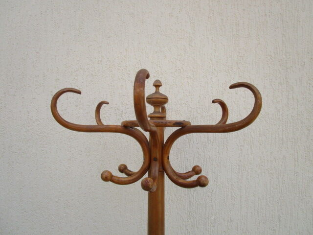 Antique parrot coat rack in blond wood