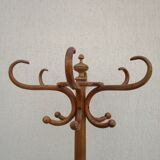 Antique parrot coat rack in blond wood