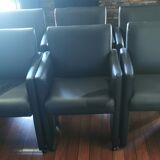 6 faux leather chairs on wheels