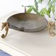 Vintage round brass tray on seahorse feet