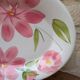 Oval serving dish with hand-painted pink flowers in San Marciano ceramic.